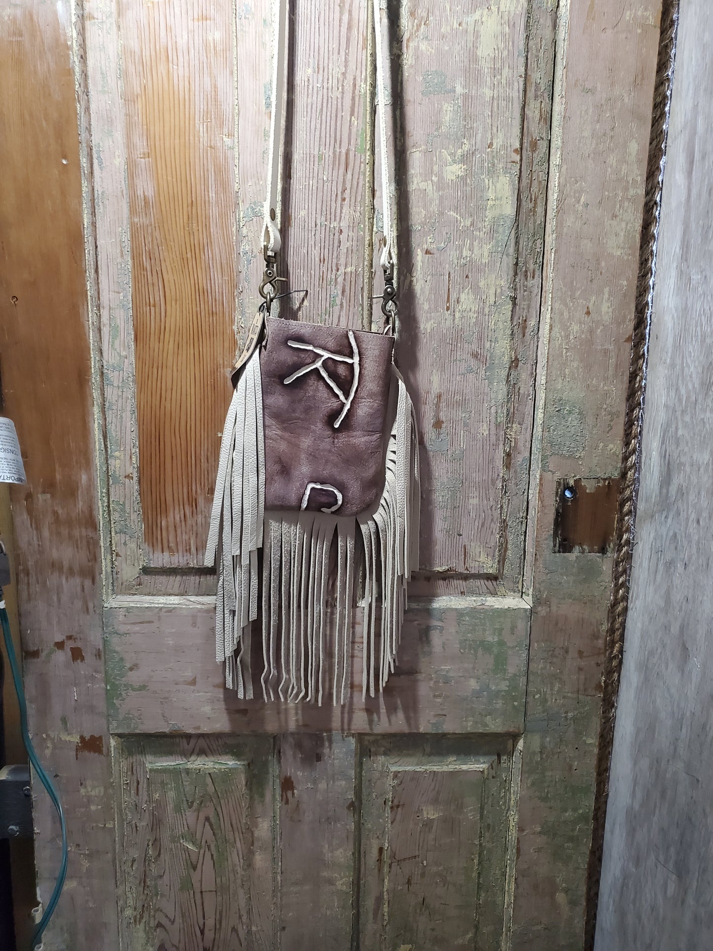 Embossed Leather Bag with Fringe