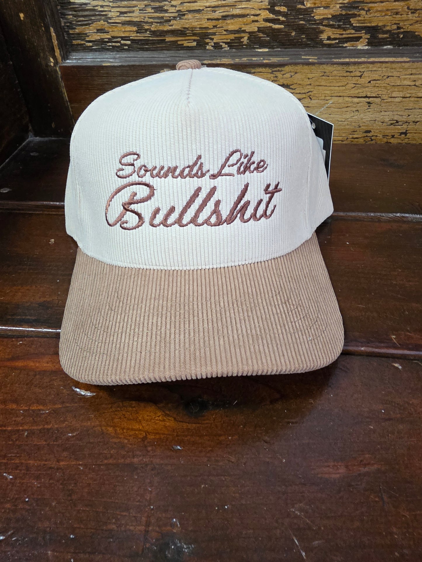Sounds Like Bullshit (brwn)                     Trucker Hat